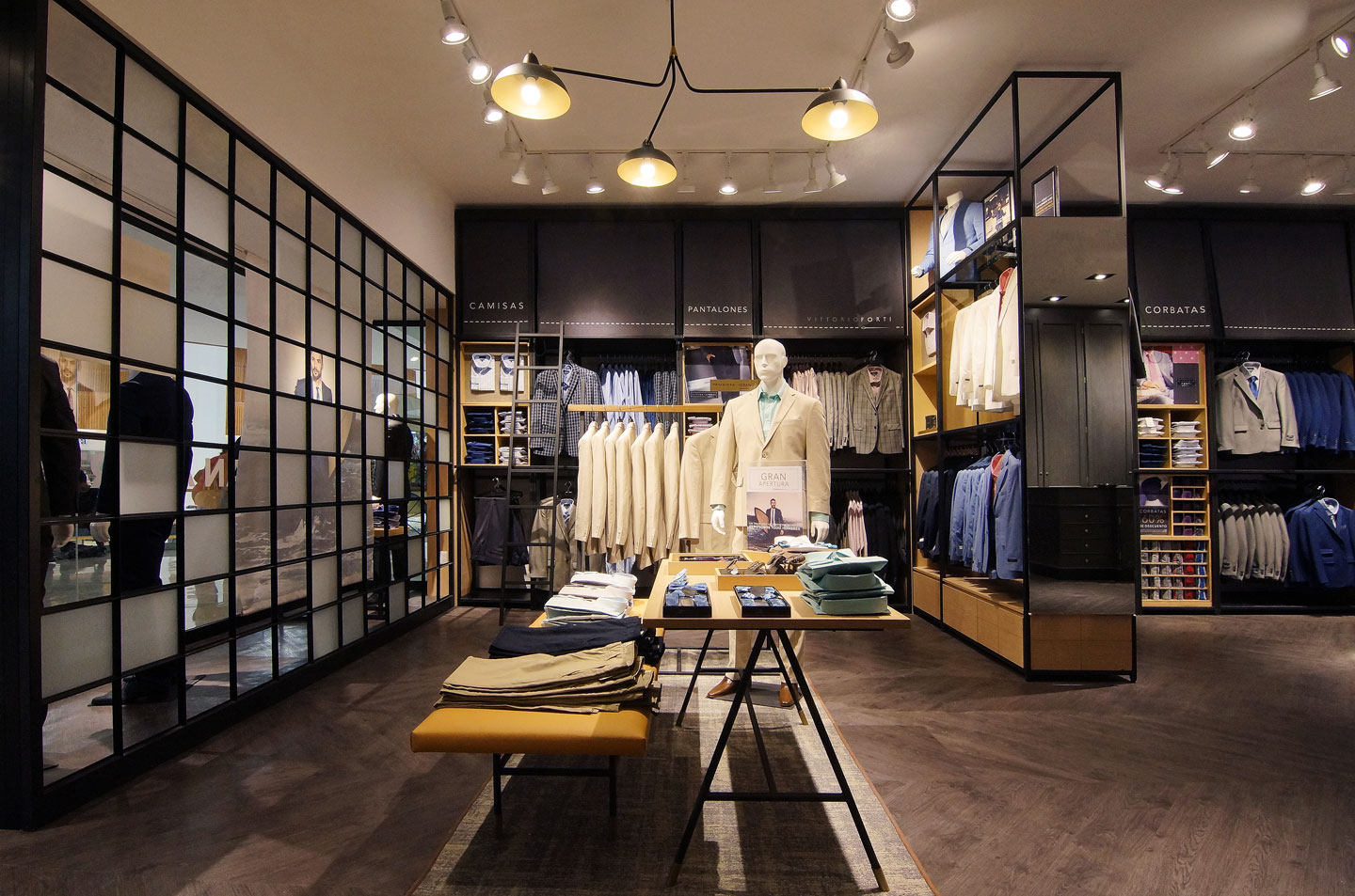 Inside retail store of men's suits with great lighting
